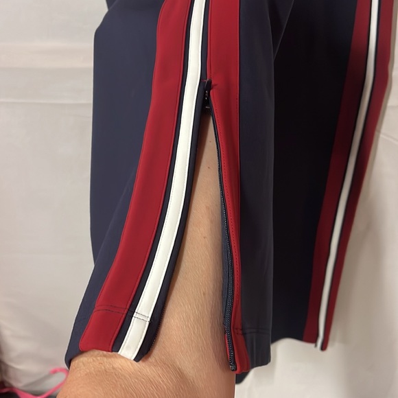 NWT Lululemon Cover your Tracks pants. Size 12. Red, white, navy blue.
LL22 - Picture 4 of 12